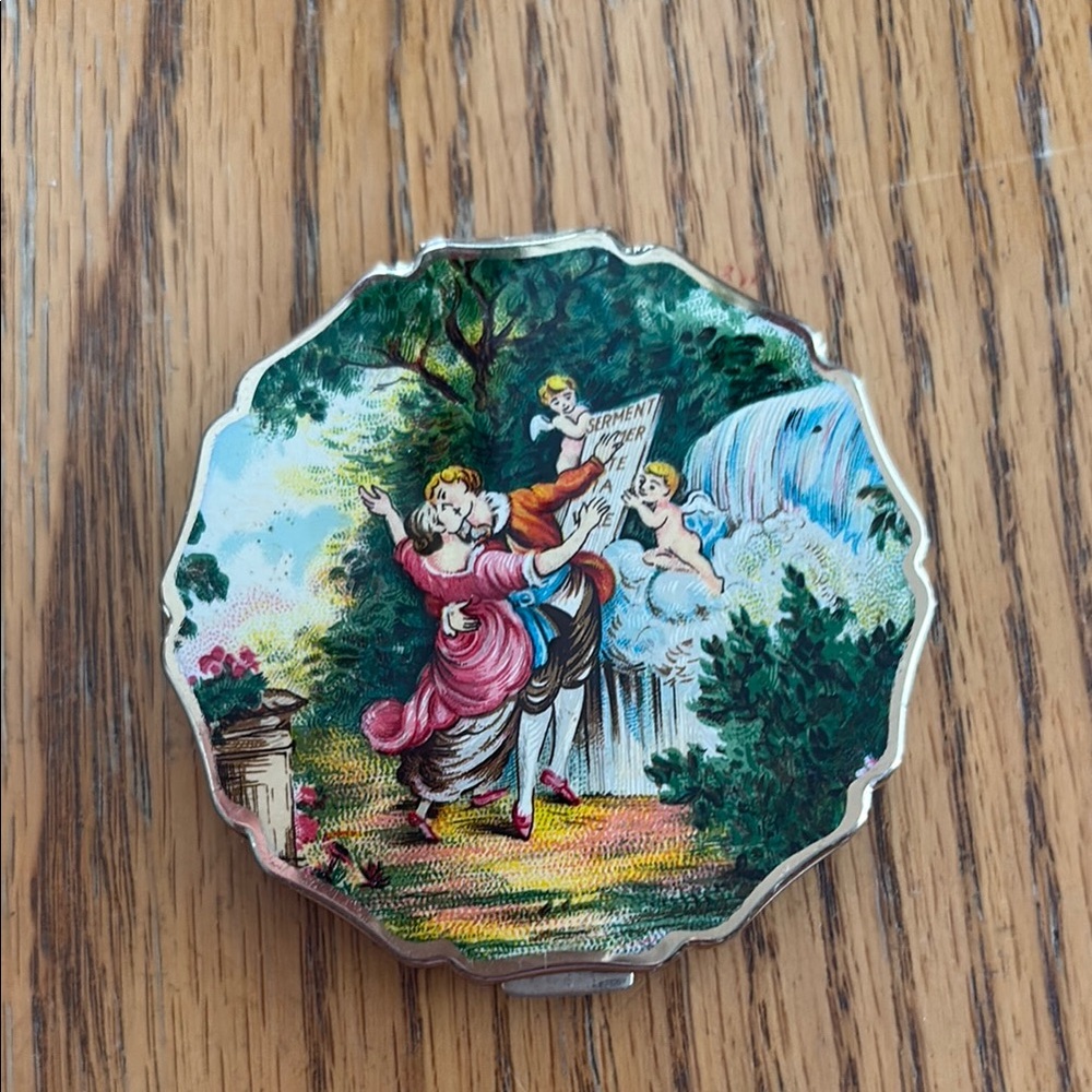 Vintage Compact with Romantic Scene